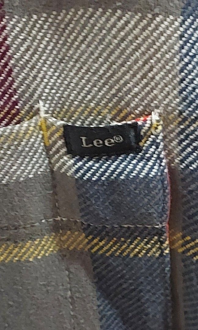 Lee Classic Flannel Plaid Shirt (Category: Luxury Apparel) located in Pozorrubio. Submitted by infinite_grind_0.1 (Listing ID 1466453710, Image 3). Description: 450 This is a Lee Classic Flannel Plaid Shirt featuring a multi-colored check pattern. on tape: chest 21 length 29.