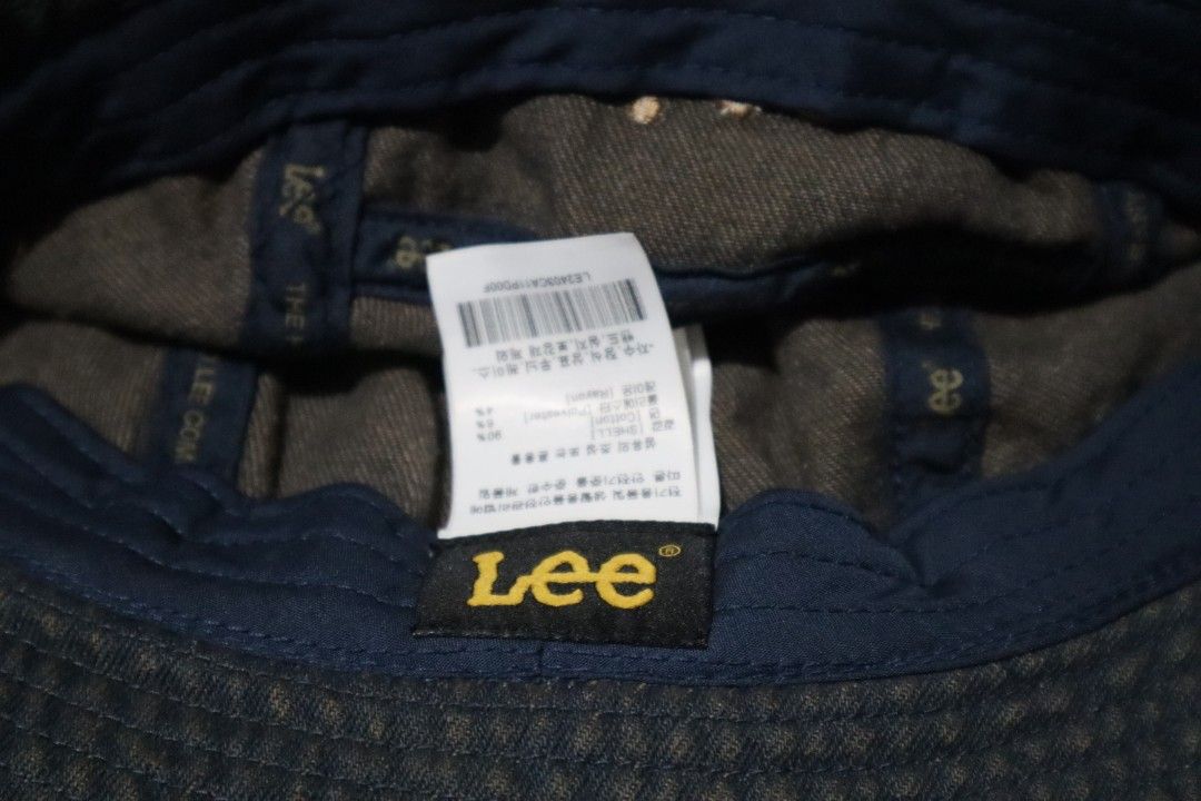 Lee Denim Bucket Hat (Category: Beanies) located in Manila. Submitted by lostandbos (Listing ID 1466464058, Image 3). Description: - Brand: Lee - Color: Dark blue denim - Material: 90% cotton blend - Features: Embroidered front logo, side eyelets for ventilation - Fit: Adjustable back strap with buckle - Condition: Great casual piece, easy to pack and travel with -need wash.