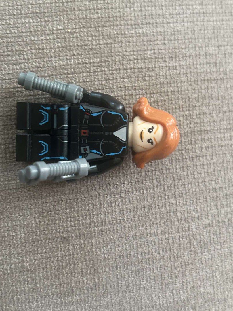 LEGO Marvel Avengers Black Widow Minifigure with Batons (Category: Lego & Building Sets) located in Makati City. Submitted by rcg98 (Listing ID 1466477446, Image 1). Description: - Character: LEGO Black Widow (Avengers Series) - Details: Reddish brown hair and black tactical suit with blue print - Accessories: Includes two grey batons - Condition: Assembled, adult-owned, and stored away from dust - Perfect for: Superhero displays or brick collect