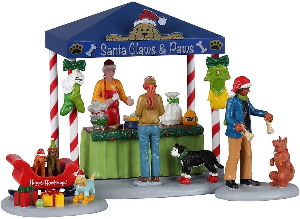 Lemax Santa Claws & Paws Shop (Category: Figurines & Statues) located in Santiago. Submitted by kitalpanga (Listing ID 1466389087, Image 1). Description: - Festive Santa Claws and Paws Christmas village miniature set - Includes vibrant market tent and shopper/worker figures - Adorable dogs dressed in cozy winter outfits - Comes with a mini sleigh loaded with gifts and toy bones - Eye-catching red, blue, green, and white holiday colors - Perfect a