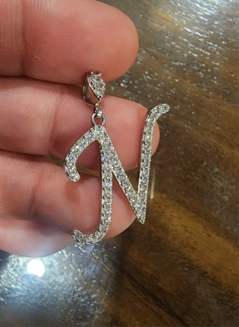 LETTER PENDANT "N" (Category: Charms) located in Manila. Submitted by chrinathalie (Listing ID 1466368980, Image 2). Description: high grade zircon setting is rhodium- whitegold plating item is tarnish resistant.