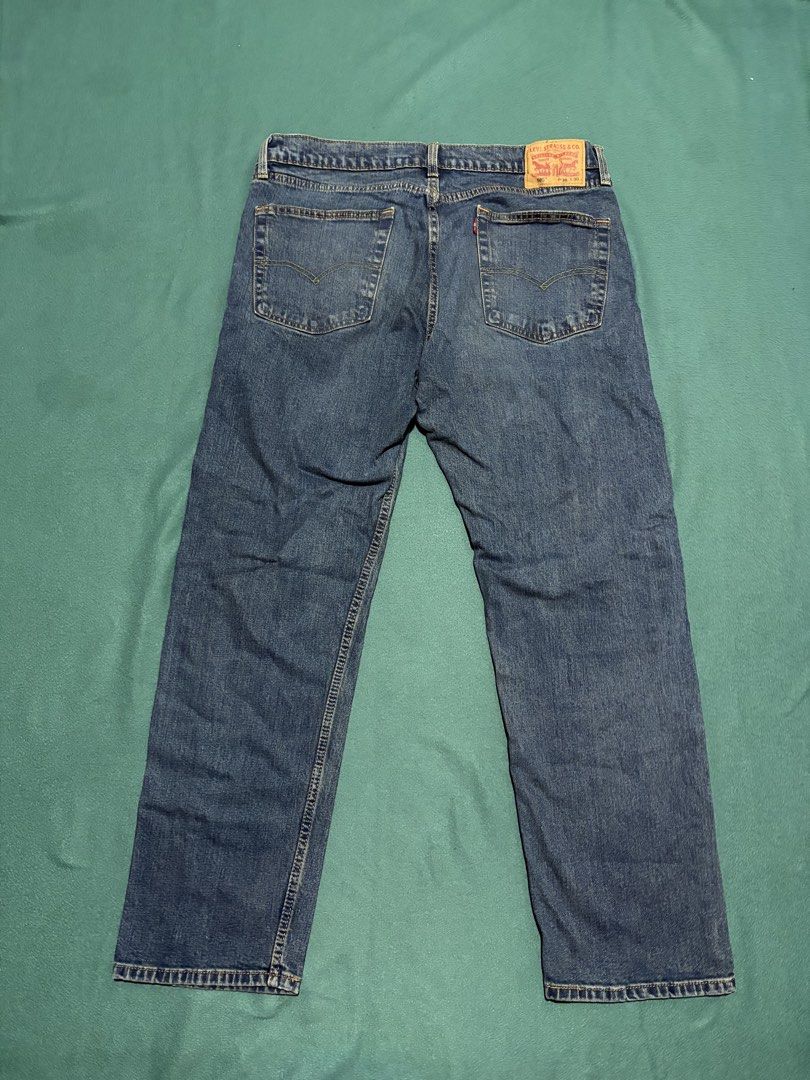 Levi's 505 Regular Fit Jeans W36 L30 (Category: Jeans) located in Guihulngan. Submitted by fbthriftgoodsniace (Listing ID 1466362451, Image 1). Description: - Brand/Model: Classic Levi's 505 Denim Jeans - Wash: Versatile Medium Blue - Details: Traditional five-pocket setup, sturdy belt loops, and iconic contrast yellow stitching - Branding: Authentic leather patch on the back waistband - Condition: Great everyday staple denim ready to wear.