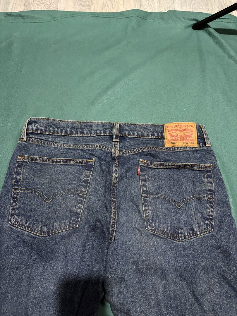 Levi's 505 Regular Fit Jeans W36 L30 (Category: Jeans) located in Guihulngan. Submitted by fbthriftgoodsniace (Listing ID 1466362451, Image 2). Description: - Brand/Model: Classic Levi's 505 Denim Jeans - Wash: Versatile Medium Blue - Details: Traditional five-pocket setup, sturdy belt loops, and iconic contrast yellow stitching - Branding: Authentic leather patch on the back waistband - Condition: Great everyday staple denim ready to wear.
