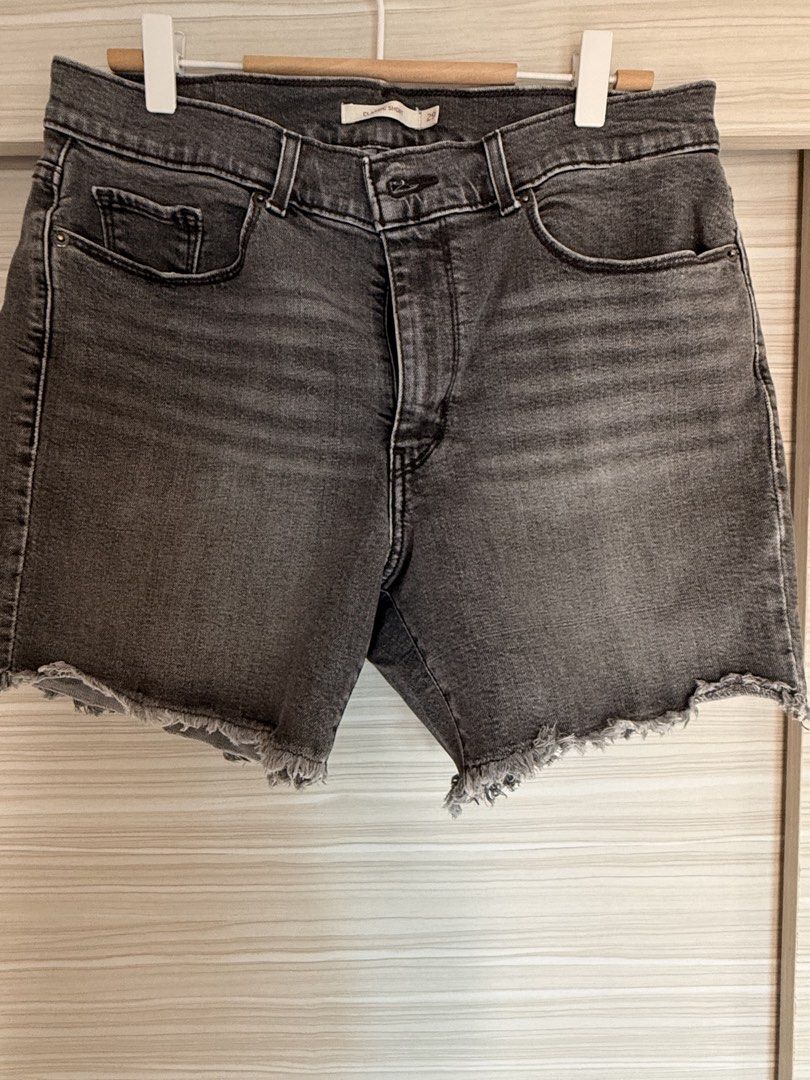 Levi's Classic Short Black Denim Size 29 (Category: Shorts) located in Taguig. Submitted by _annaq_ (Listing ID 1466384822, Image 1). Description: - Brand: Levi's - Color: Washed black - Size: 29 (inner tag) - Style: Classic five-pocket with button fly - Details: Raw hem with frayed edges, back leather patch, and signature red tab - Condition: Great everyday staple piece - Ships immediately across the Philippines! For everyone’s fairness and tran