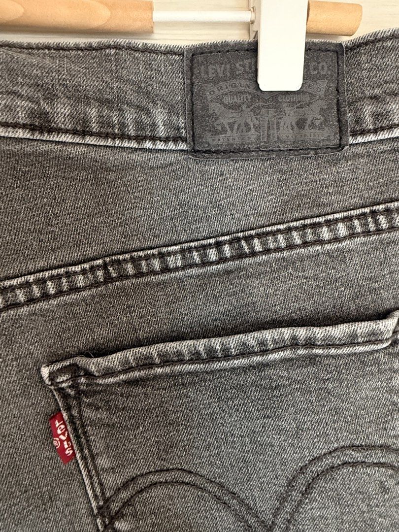 Levi's Classic Short Black Denim Size 29 (Category: Shorts) located in Taguig. Submitted by _annaq_ (Listing ID 1466384822, Image 3). Description: - Brand: Levi's - Color: Washed black - Size: 29 (inner tag) - Style: Classic five-pocket with button fly - Details: Raw hem with frayed edges, back leather patch, and signature red tab - Condition: Great everyday staple piece - Ships immediately across the Philippines! For everyone’s fairness and tran