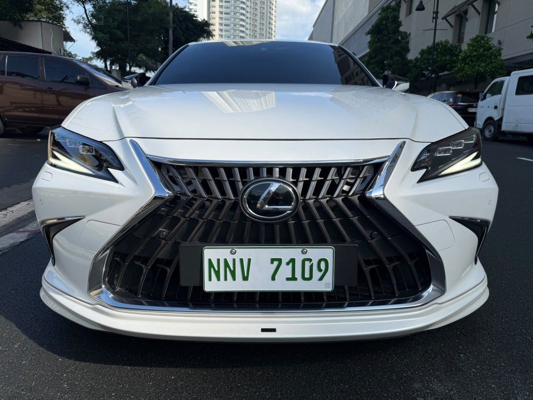 Lexus ES300h Premier 2023 jackani Auto (Category: Used Cars) located in Pasig City. Submitted by jackani (Listing ID 1466423247, Image 2). Description: 2023 Lexus ES300H Premier top of the line Hybrid 10,000 km only casa maintained Aimgain Full Body Kit Aimgain Wheels Michelin Sport Tires JC Car Audio Sound System pearl white original paint full casa warranty U can call 09173295586.