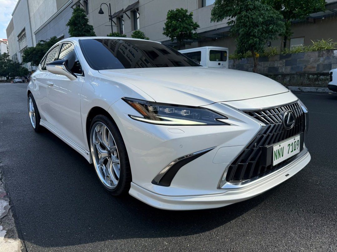 Lexus ES300h Premier 2023 jackani Auto (Category: Used Cars) located in Pasig City. Submitted by jackani (Listing ID 1466423247, Image 1). Description: 2023 Lexus ES300H Premier top of the line Hybrid 10,000 km only casa maintained Aimgain Full Body Kit Aimgain Wheels Michelin Sport Tires JC Car Audio Sound System pearl white original paint full casa warranty U can call 09173295586.