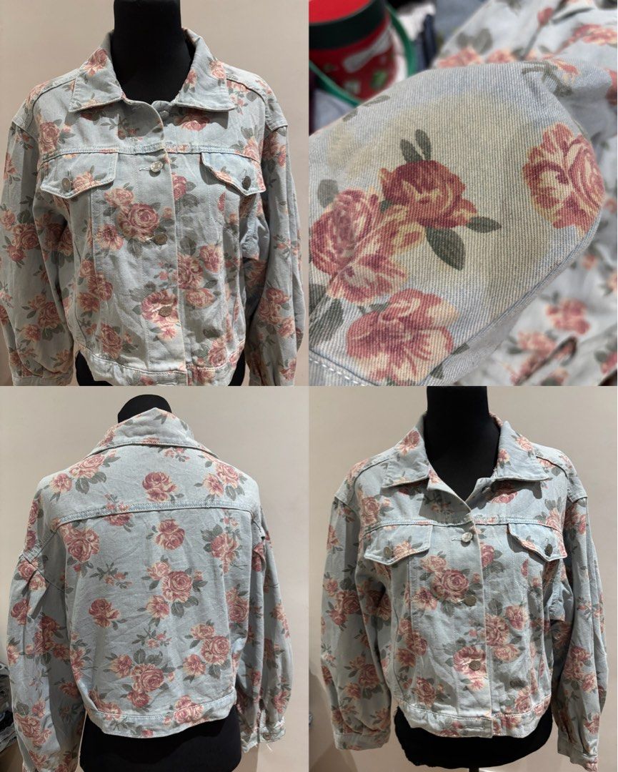 Light Blue Floral Print Denim Jacket (Category: Coats, Jackets and Outerwear) located in Manila. Submitted by mpt99876 (Listing ID 1466519682, Image 1). Description: - Color & Wash: Light blue vintage-wash denim - Design: All-over pink rose pattern - Closure: Classic button-up front with collar - Pockets: Two functional chest flap pockets - Sleeves: Long sleeves with button cuffs - Fabric: Textured denim with a structured feel.