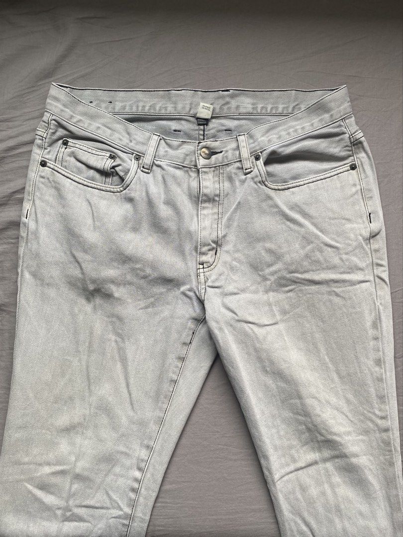 Light Grey Denim Jeans Size 34/30 (Category: Jeans) located in Cavite. Submitted by pax_justinn (Listing ID 1466491529, Image 2). Description: - Size: 34/30 - Color: Versatile light grey wash - Style: Classic five-pocket design with zip fly and button closure - Fit: Comfortable for everyday wear - Condition: Clean and ready to wear - Origin: Made in China.