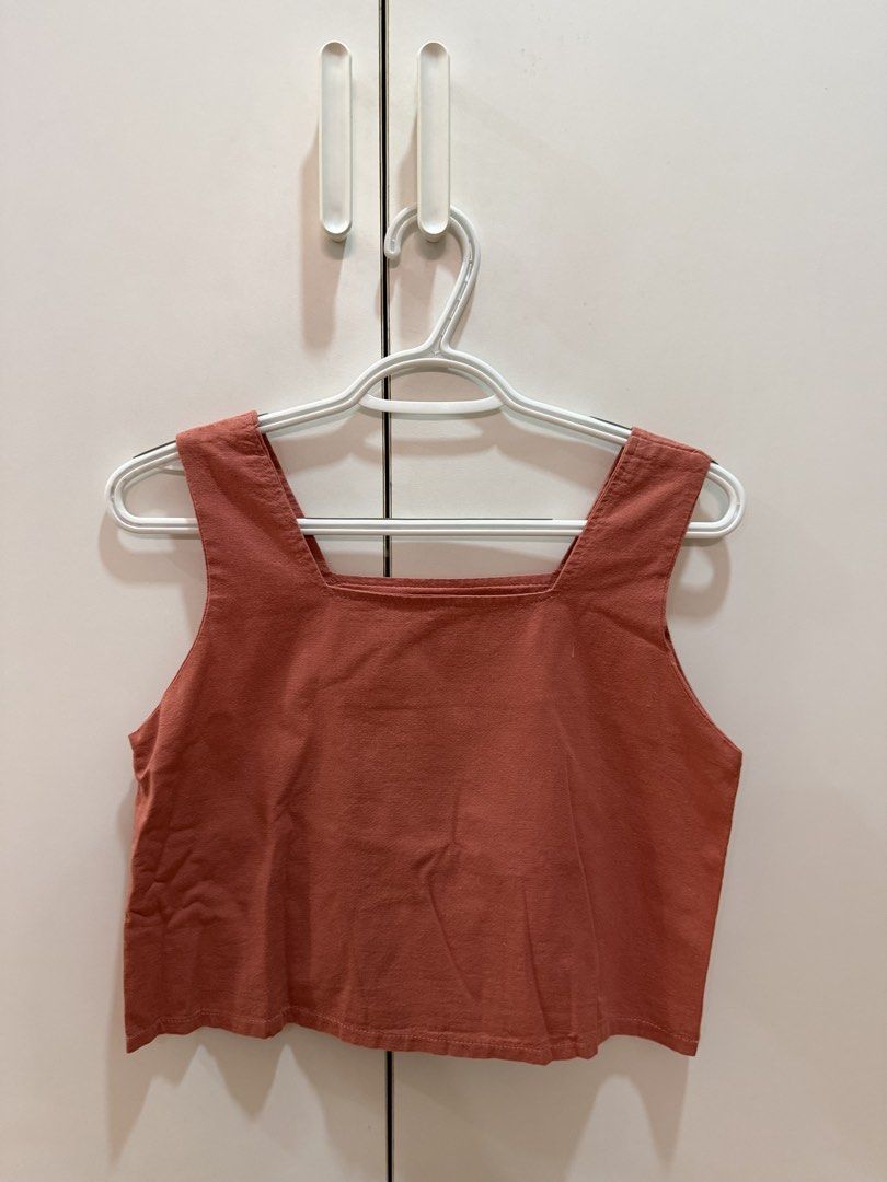 Linen Terracotta sleeveless top (Category: Sleeveless) located in Quezon City. Submitted by hazpreloved (Listing ID 1466425897, Image 1). Description: Linen terracotta sleeveless top Free size, best fits XS-Small Bought in a bazaar Discounts for bulk orders Tags: shein, mango, pull & bear, h&m, cotton on.