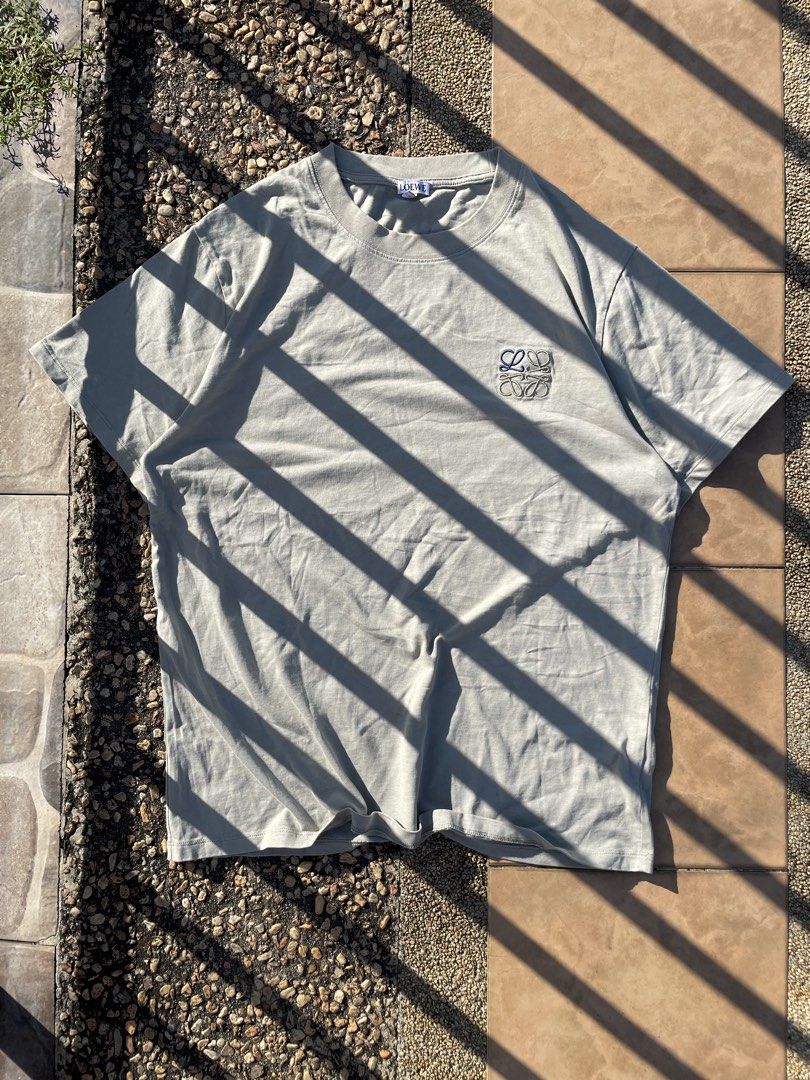 Loewe anagram tee (Category: Tshirts & Polo Shirts ) located in Tagaytay City. Submitted by thriftphil.ph (Listing ID 1466344528, Image 1). Description: Condition:10/10 Colorate:10/10 SIZE: W:21 L:27.