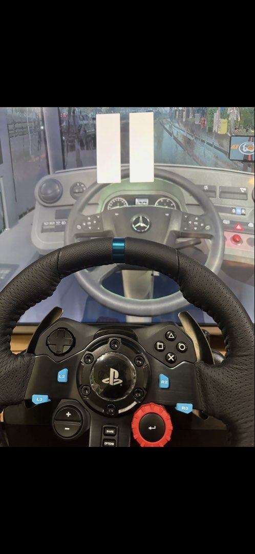 Logitech G29 Driving Force Racing Wheel PlayStation PC (Category: Controllers) located in Makati City. Submitted by grgdlm (Listing ID 1466525785, Image 2). Description: Complete, steering wheel and pedal, standard g29 package NO STICK SHIFTER No issue, working 100% Makati pickup location, can lalamove Rfs: lipat bahay - Logitech G29 racing wheel setup in clean, working condition - Compatible with PlayStation layout (D-pad, face buttons, red dial