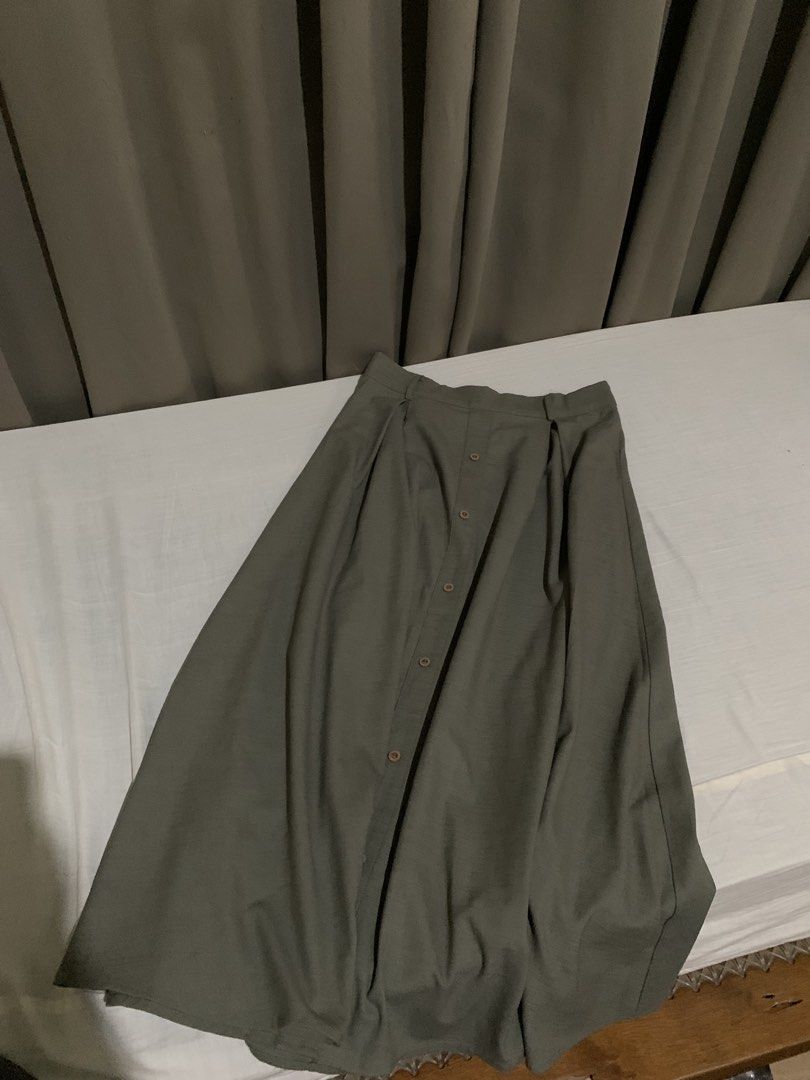 Long Flowy Skirt - Army Green (Category: Skirts) located in Manila. Submitted by belleflor (Listing ID 1466423256, Image 2). Description: This is a beautiful, army green long skirt that flows elegantly with every step. Made from a lightweight, breathable fabric, it features a relaxed and comfortable fit that drapes beautifully. The rich, earthy army green color makes it incredibly versatile—perfect for pairing with a simple white tank top and san
