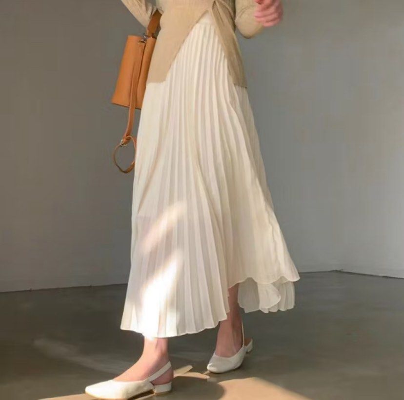 Long Pleated Skirt - Cream (Category: Skirts) located in Manila. Submitted by belleflor (Listing ID 1466421470, Image 3). Description: This is a beautiful long pleated skirt that flows elegantly and holds its shape perfectly. It features a comfortable waistband and a classic pleated design that adds instant texture and movement to any outfit. It’s incredibly versatile—you can easily dress it up with a blouse and heels or keep it casual with a sim