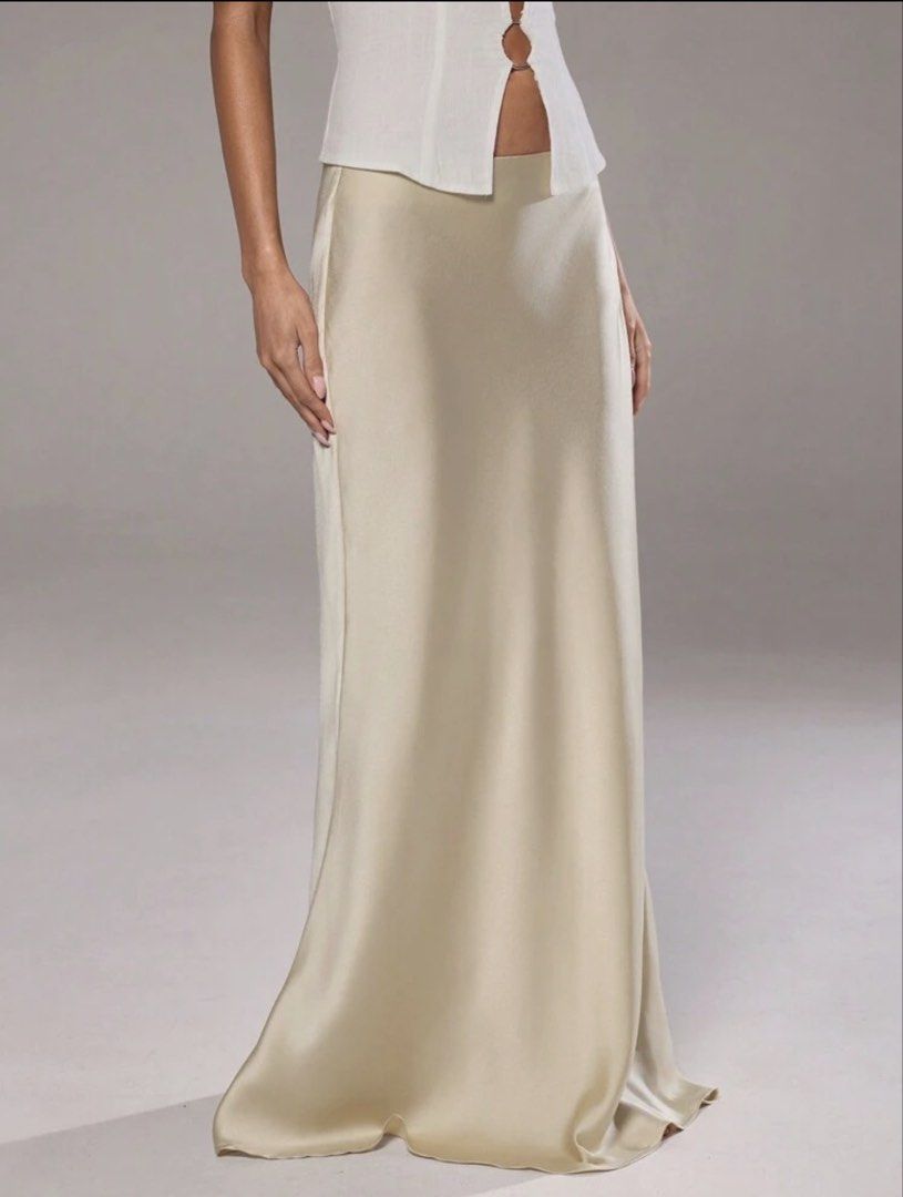 Long satin cream skirt (Category: Skirts) located in Manila. Submitted by wearmine2.0 (Listing ID 1466444673, Image 3). Description: Size xs to small 24-26 cm •You can message me if you’d like to see more or actual photos. • This is my second account. My original account (@wearmine) is currently inaccessible as I lost my registered number and can’t receive the verification code. You can still check it for more positive reviews. • Lalamove • JnT •