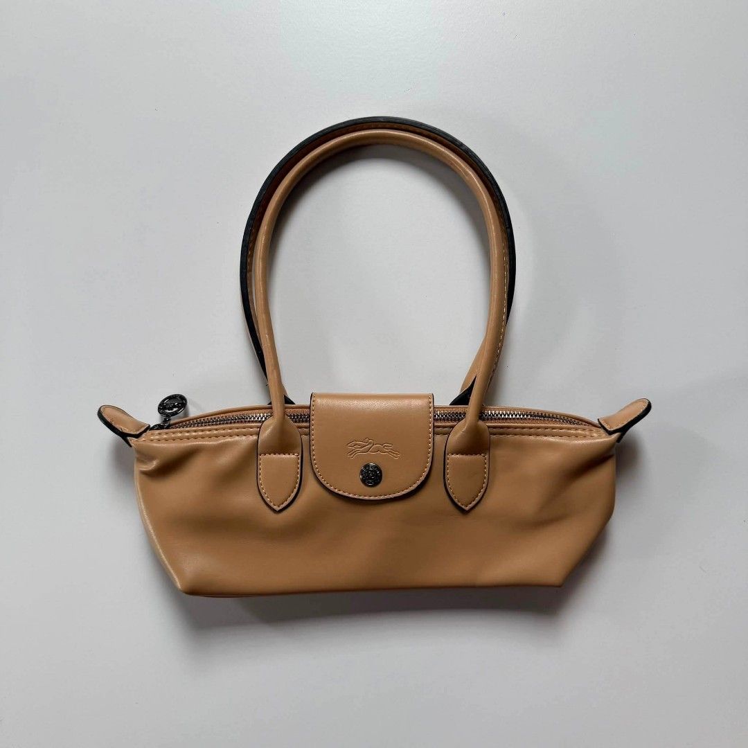 Longchamp cashew Xtra small le pilage (Category: Shoulder Bags) located in Aloran. Submitted by vintgbags (Listing ID 1466441247, Image 1). Description: All details are posted Condition is Good. Open for negotiable sent your offer..