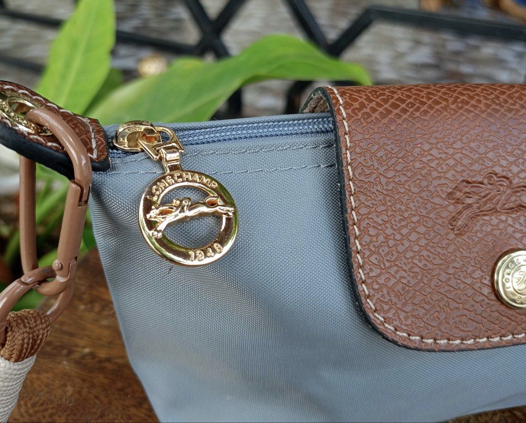 Longchamp purse blue (Category: Purses & Pouches) located in Barugo. Submitted by green.trendsetter (Listing ID 1466398463, Image 3). Description: PRELOVED FINDS FROM JAPAN PLEASE READ BEFORE PURCHASING • PRELOVED MEANS PRELOVED. Each piece has been previously loved and may naturally have signs of use such as creasing, scratches, stains, discoloration, or other imperfections. Kindly manage your expectations accordingly. • AUTHENTICITY IS NOT GUAR