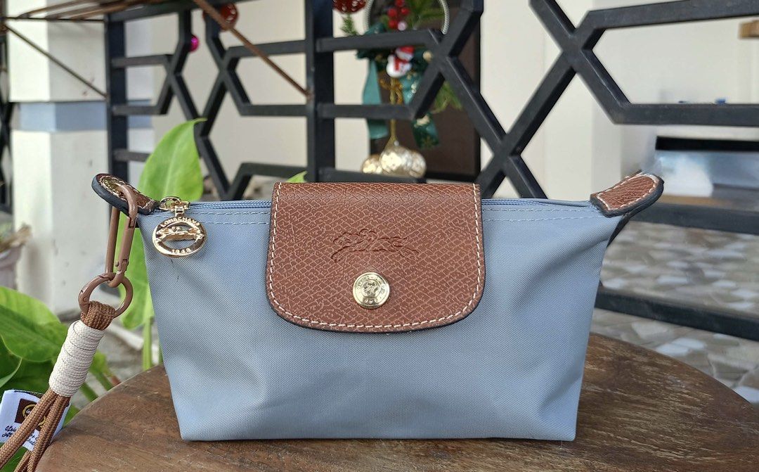 Longchamp purse blue (Category: Purses & Pouches) located in Barugo. Submitted by green.trendsetter (Listing ID 1466398463, Image 1). Description: PRELOVED FINDS FROM JAPAN PLEASE READ BEFORE PURCHASING • PRELOVED MEANS PRELOVED. Each piece has been previously loved and may naturally have signs of use such as creasing, scratches, stains, discoloration, or other imperfections. Kindly manage your expectations accordingly. • AUTHENTICITY IS NOT GUAR