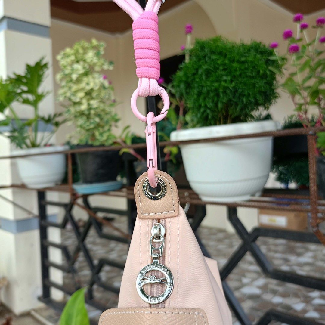 Longchamp purse pink (Category: Purses & Pouches) located in Barugo. Submitted by green.trendsetter (Listing ID 1466398183, Image 3). Description: PRELOVED FINDS FROM JAPAN PLEASE READ BEFORE PURCHASING • PRELOVED MEANS PRELOVED. Each piece has been previously loved and may naturally have signs of use such as creasing, scratches, stains, discoloration, or other imperfections. Kindly manage your expectations accordingly. • AUTHENTICITY IS NOT GUAR