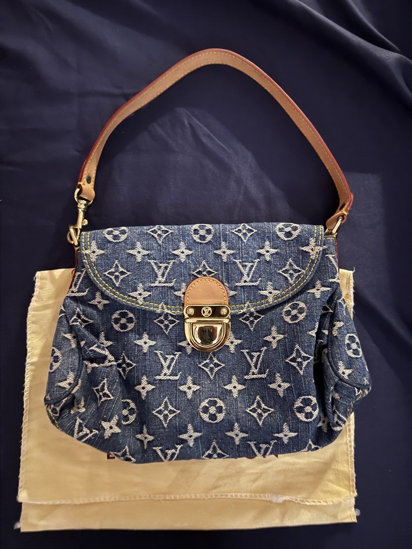 Louis Vuitton Blue Denim Pleaty Monogram Bag (Category: Purses & Pouches) located in Iloilo. Submitted by dabyladaby2 (Listing ID 1466462220, Image 1). Description: Second hand finds Self Authenticate as I also bought it online as second hand . No holes just signs of usage. Auth. Not Guaranteed With replacement dustbag .