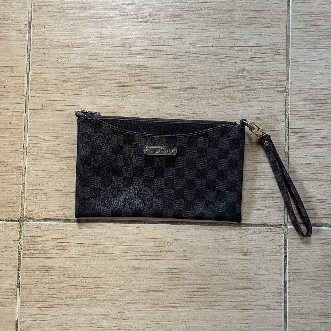 Louis Vuitton Brown Damier Graphite Clutch Bag (Category: Luxury Bags & Wallets) located in Lucena. Submitted by __timeless.luxury (Listing ID 1466440413, Image 1). Description: Louis Vuitton Brown Damier Graphite Clutch Bag Complete | Rank: B Has minor flaws .