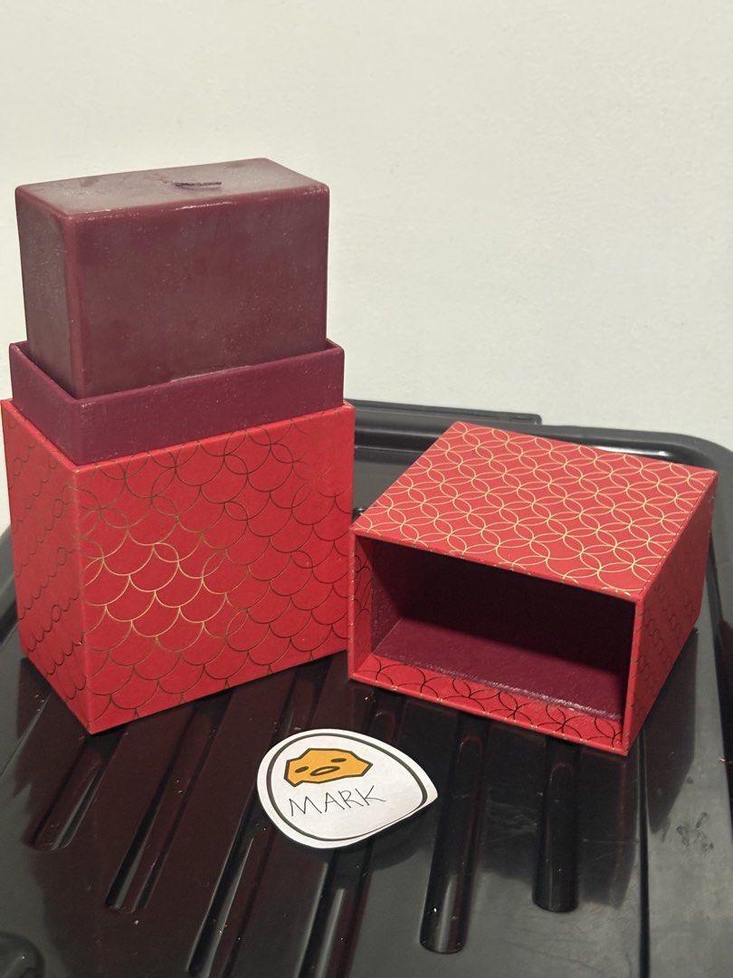 Louis Vuitton Candle Chinese Dragon (Category: Home Fragrance) located in Cebu City. Submitted by xoxoxo888marco (Listing ID 1466533312, Image 2). Description: - Authentic Louis Vuitton Scented Candle - Deep red wax block featuring an exquisite embossed animal motif - Includes a gorgeous red and gold patterned storage box with a luxury burgundy interior - Bottom label includes complete ingredients (palm wax) and safety warnings - Made in China - 