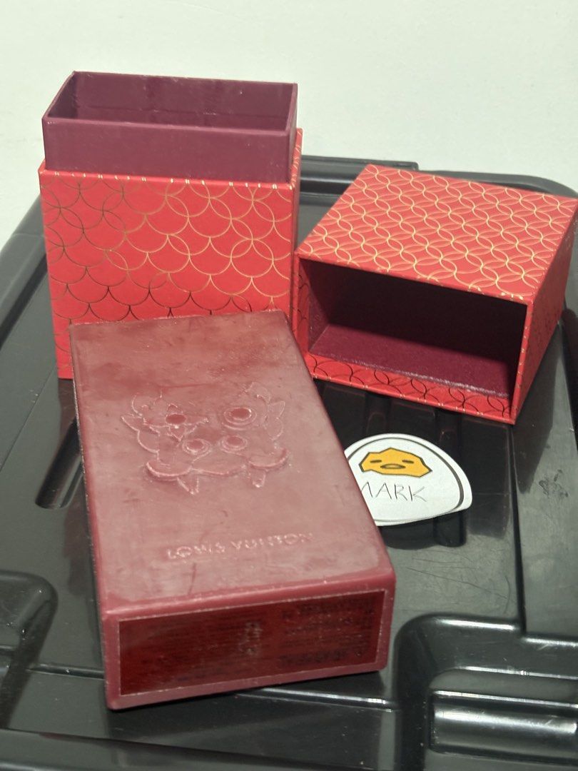 Louis Vuitton Candle Chinese Dragon (Category: Home Fragrance) located in Cebu City. Submitted by xoxoxo888marco (Listing ID 1466533312, Image 1). Description: - Authentic Louis Vuitton Scented Candle - Deep red wax block featuring an exquisite embossed animal motif - Includes a gorgeous red and gold patterned storage box with a luxury burgundy interior - Bottom label includes complete ingredients (palm wax) and safety warnings - Made in China - 