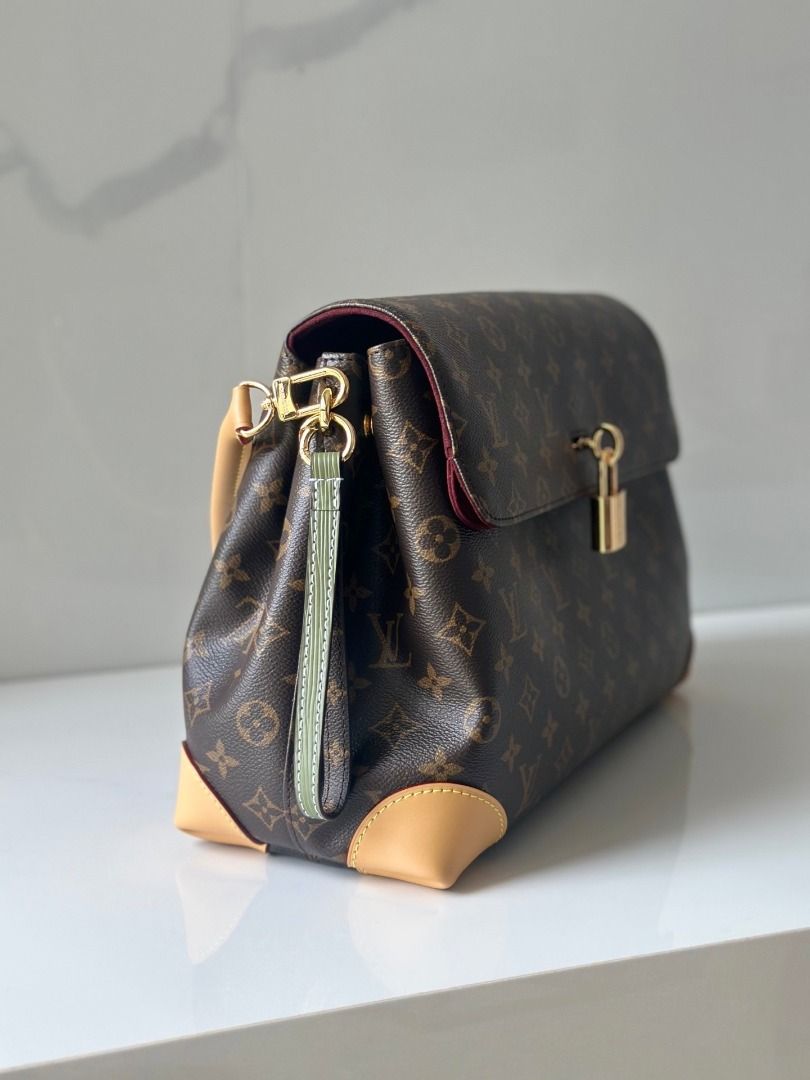 Louis Vuitton Monogram Canvas Shoulder Bag (Category: Luxury Bags & Wallets) located in Quezon City. Submitted by vangjalaya37815 (Listing ID 1466441496, Image 3). Description: - Authentic Louis Vuitton Monogram canvas shoulder bag with signature brown and tan pattern - Premium cowhide leather trim and durable structured handle - Secure functional front padlock closure featuring iconic LV engraving - Protected bottom corners with reinforced leath