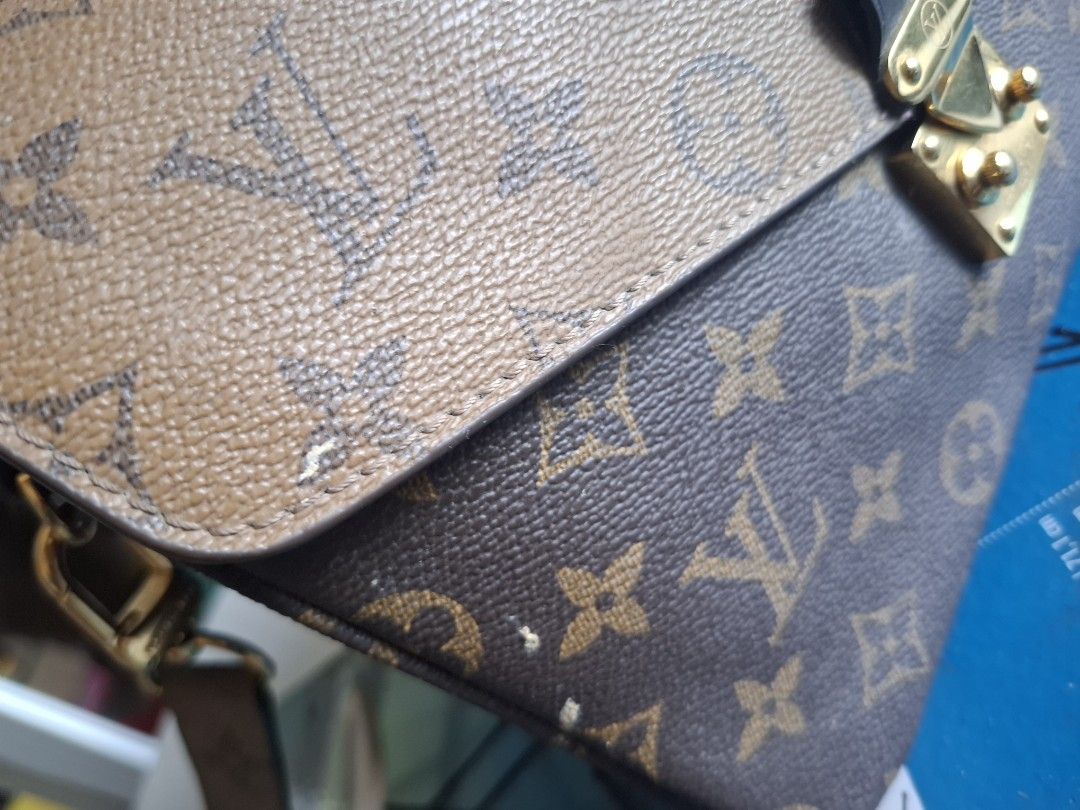 Louis Vuitton Monogram Shoulder Bag (Category: Luxury Bags & Wallets) located in Marikina City. Submitted by bags21.ph (Listing ID 1466337496, Image 2). Description: - Classic monogram canvas in rich brown and tan tones - Structured flap design with secure gold-tone hardware clasp - Includes a detachable strap with Louis Vuitton engraved gold lobster clasps - Spacious multi-compartment interior featuring stylish contrast-colored panels - Versatil