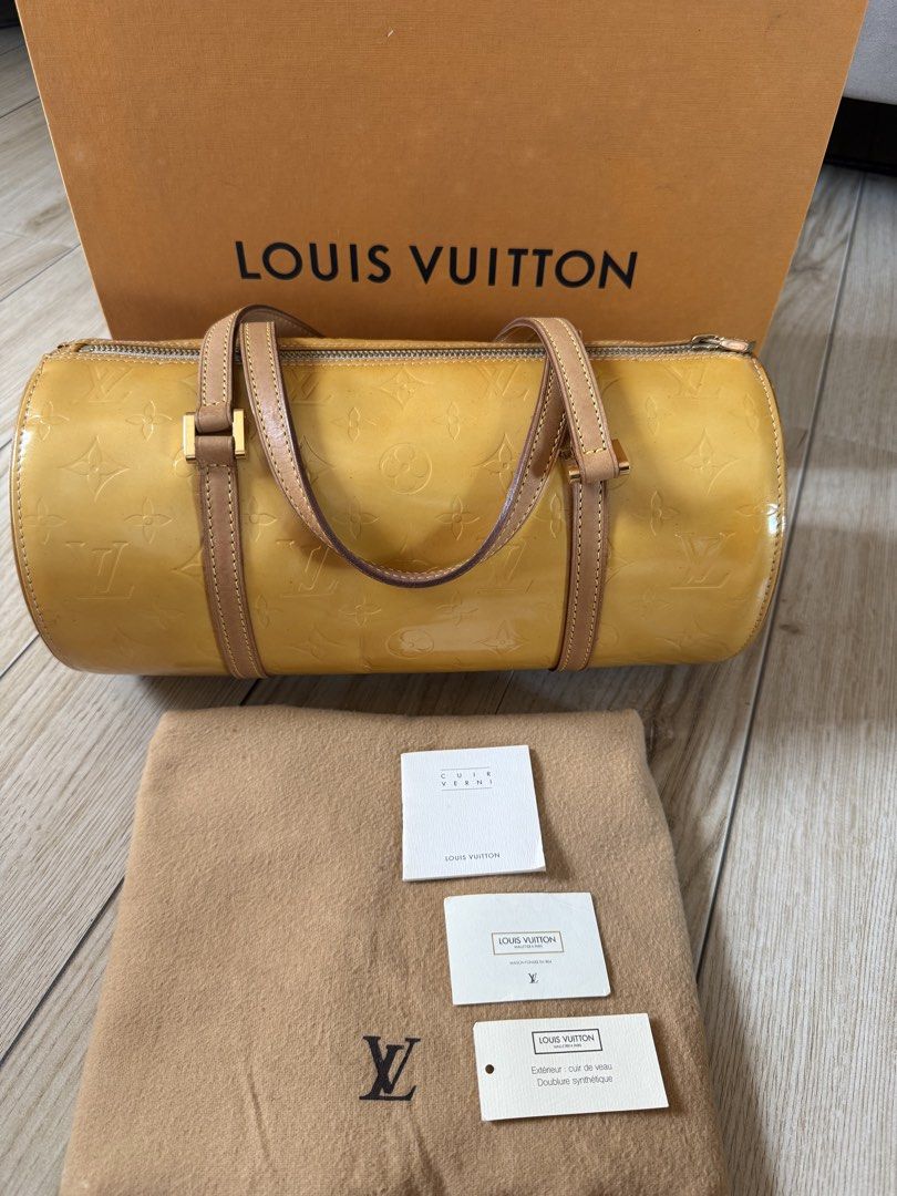 Louis Vuitton Monogram Vernis (Category: Luxury Bags & Wallets) located in Manila. Submitted by mariadarna (Listing ID 1466550699, Image 1). Description: yellow Louis Vuitton Monogram Vernis Bedford Bag crafted from embossed patent leather with natural vachetta leather handles.