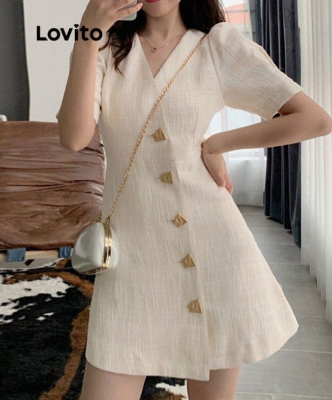 Lovito dress (Category: Dresses) located in Bacoor. Submitted by katecassan85266 (Listing ID 1466386766, Image 3). Description: Sis! Selling this super pretty Lovito dress in creamy beige, size L (fits EU 40 / UK 12 / US 8). It features a classy V-neck, cute puff sleeves, and chic gold-toned statement buttons down the front. Meetups possible at Central Camella Springville, Bacoor, Cavite. Grab it before it sells fast!.