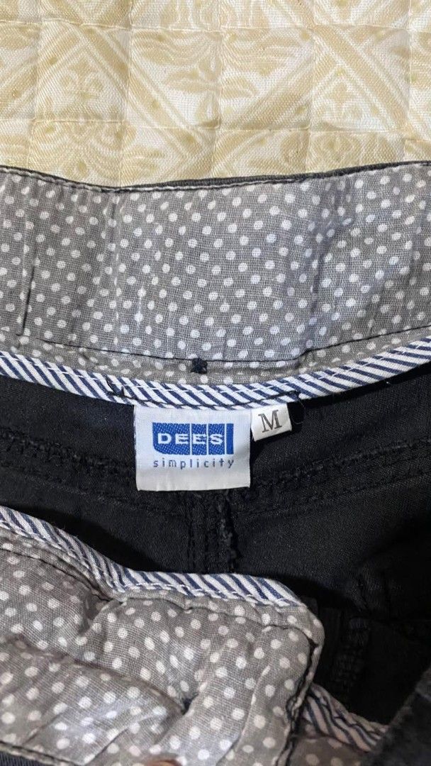 Low rise micro short (Category: Shorts) located in Pagadian. Submitted by kahtlopez47867 (Listing ID 1466476526, Image 3). Description: - Brand: Dees Simplicity - Size: Medium (M) - Color: Dark Grey - Condition: Clean, ready to wear - Features: Button closure details on front and back pockets - Special Detail: Grey and white polka dot inner waistband with striped binding trim.