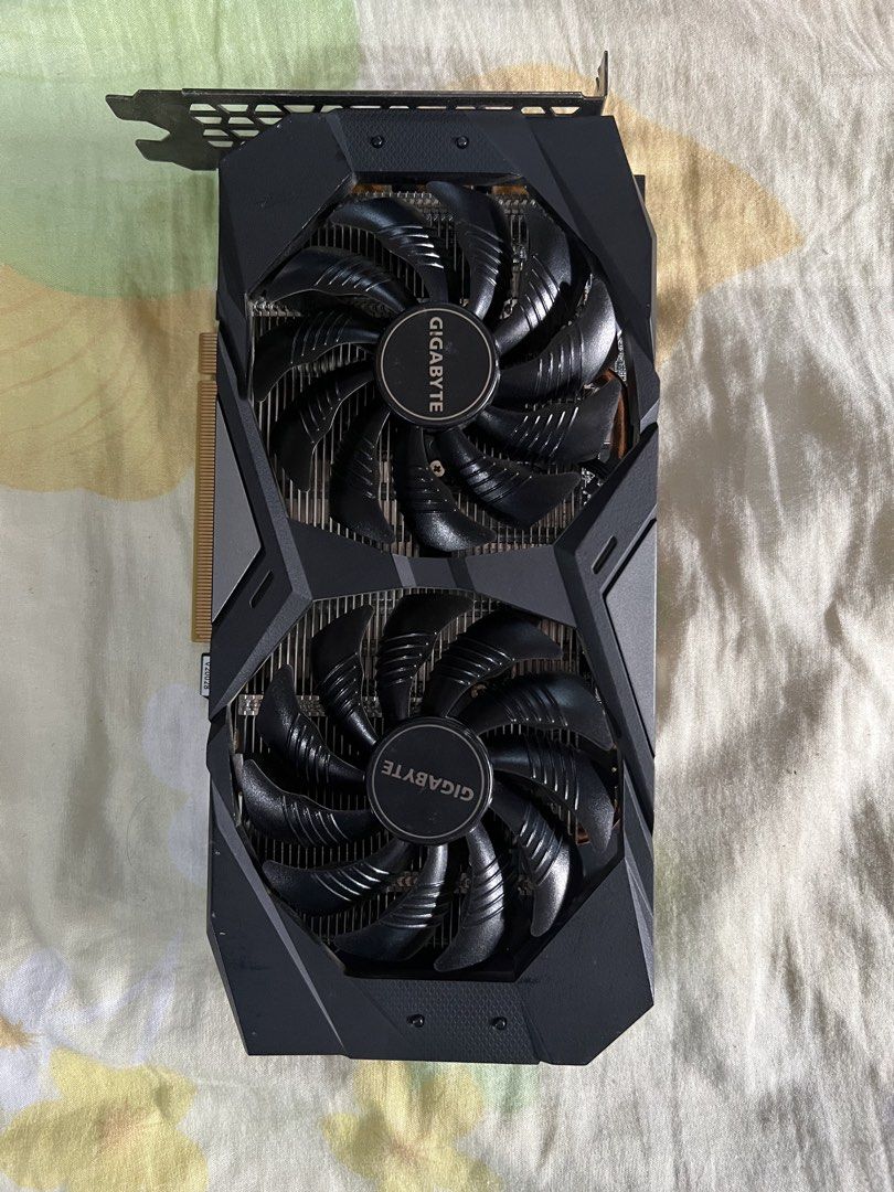LS: Gigabyte GeForce RTX 2060 Graphics Card (Category: Computer Parts) located in Manila. Submitted by pvboni11 (Listing ID 1466457349, Image 2). Description: LOOKING TO SWAP FOR A 3070 or higher GPU. Willing to add cash. SPECS: - Model: Gigabyte GeForce RTX 2060 6GB - Cooling: Dual fans with copper heat pipes - Build: Includes sturdy backplate - Ports: Standard DisplayPort and HDMI video outputs - Power: Requires a single 8-pin power connector -