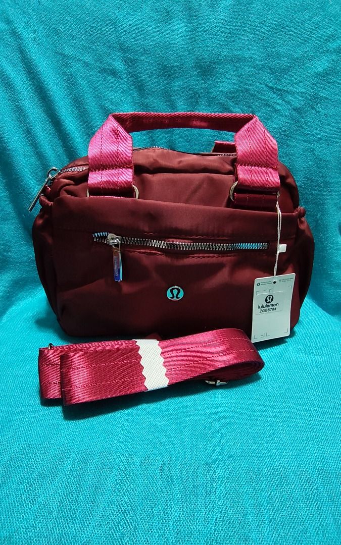 Lulu Lémøn Hand / Sling Bag Maroon (Category: Cross-body Bags) located in Las Pinas. Submitted by jpmshoppe (Listing ID 1466479076, Image 1). Description: Hand Bag with detachable sling strap Maroon in color Very spacious inside 3 outer zipper pockets and 2 side open pockets.
