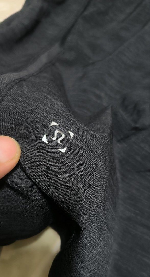 Lululemon Black Athletic Shorts Size L (Category: Shorts) located in Manila. Submitted by itsmelawrence (Listing ID 1466356981, Image 3). Description: - Brand: Lululemon - Size: L 29+ x19 - Color: Classic Black - Fit: Adjustable drawstring waistband - Features: Reflective logo detail, soft textured fabric - Condition: Clean, brand new with tags - Ideal for: Running, gym workouts, or casual wear.