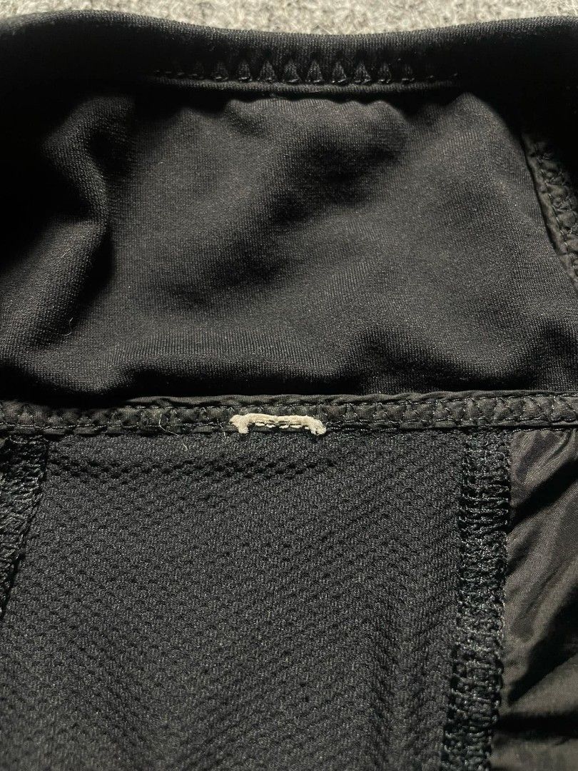 Lululemon Black Athletic Zip Jacket (Category: Activewear) located in Ligao. Submitted by merjudioma64633 (Listing ID 1466386865, Image 3). Description: - Brand: Lululemon - Color: Black - Style: Full-zip athletic jacket / lightweight windbreaker - Breathability: Mesh panels on sides and back - Features: High collar, long sleeves with ribbed cuffs, iconic logo near back hem - Condition: Excellent - Perfect for: Running, workouts, and casual wear.