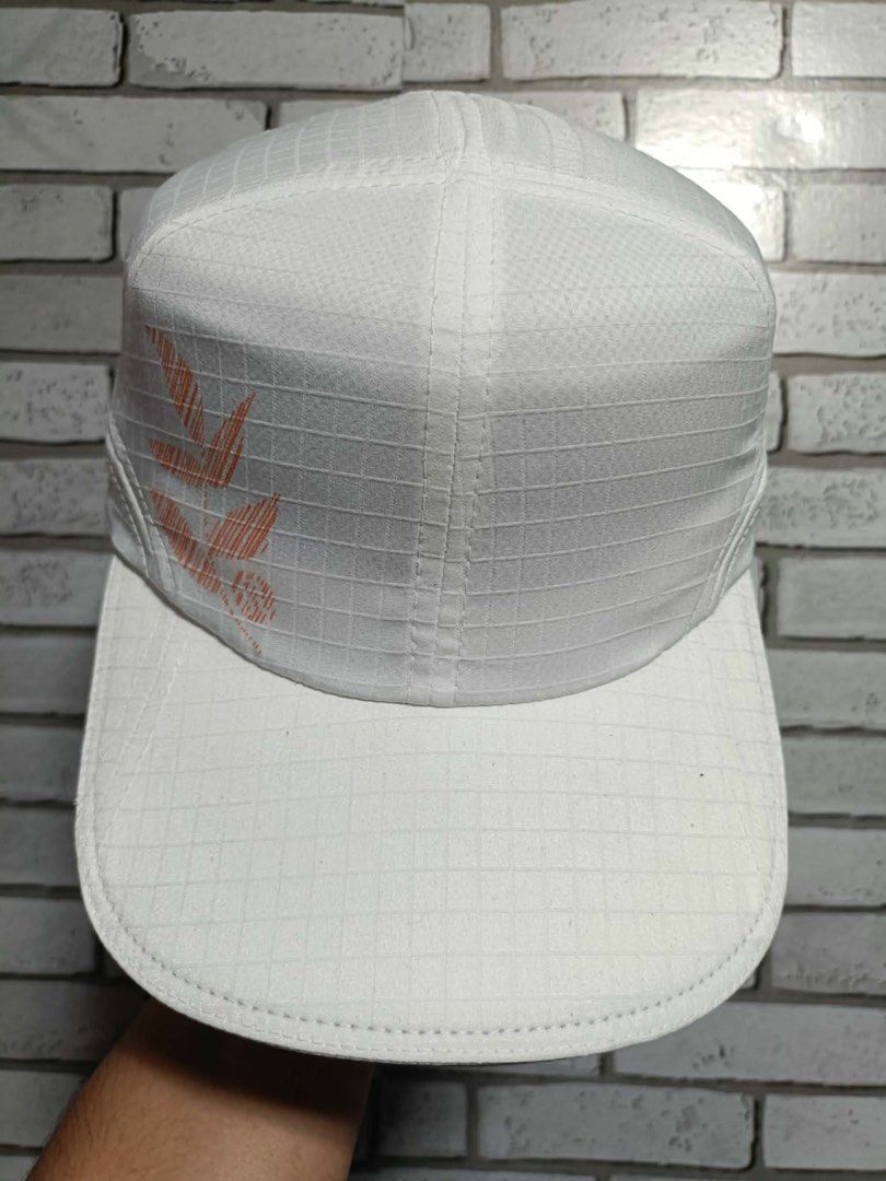 Lululemon White Ripstop Running Cap Hat Silver Omega Logo Orange Leaf Graphic Adjustable (Category: Activewear) located in Cagayan de Oro. Submitted by rayuki39 (Listing ID 1466449317, Image 1). Description: .