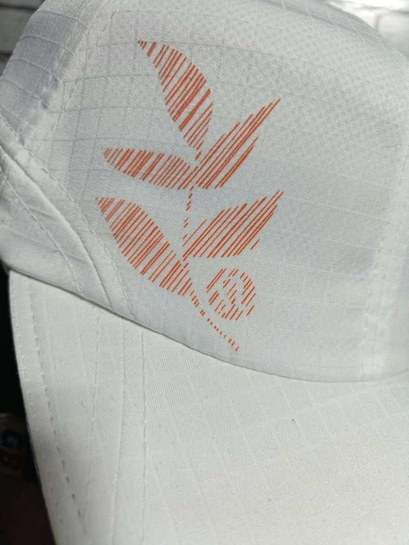 Lululemon White Ripstop Running Cap Hat Silver Omega Logo Orange Leaf Graphic Adjustable (Category: Activewear) located in Cagayan de Oro. Submitted by rayuki39 (Listing ID 1466449317, Image 3). Description: .