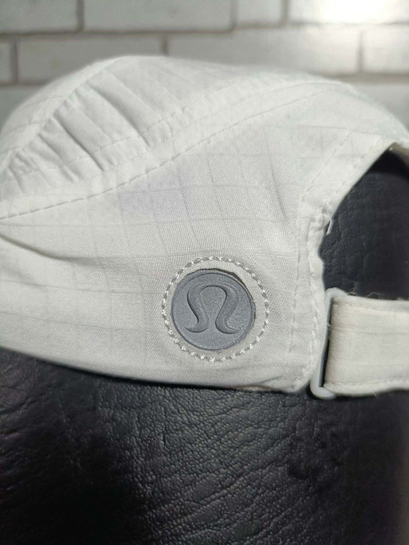 Lululemon White Ripstop Running Cap Hat Silver Omega Logo Orange Leaf Graphic Adjustable (Category: Activewear) located in Cagayan de Oro. Submitted by rayuki39 (Listing ID 1466449317, Image 2). Description: .