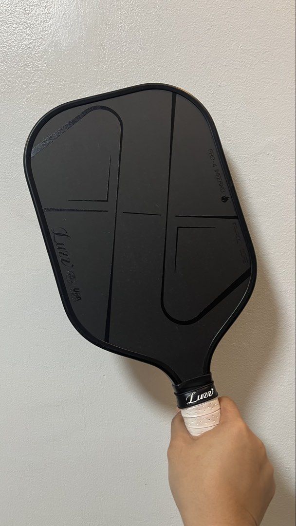 Luzz Pro 4 Inferno Darkness (Category: Racket and Ball Sports) located in Marilao. Submitted by tincartph (Listing ID 1466341739, Image 3). Description: FOR SALE Luzz Pro 4 Inferno Darkness selling for only ₱10k‼️ original price is ₱16,999 used for only 2 OP good condition almost like brand new issue: minimal paint chips dahil sa bagong court but does not affect the performance RFS: extra paddle di nagagamit .