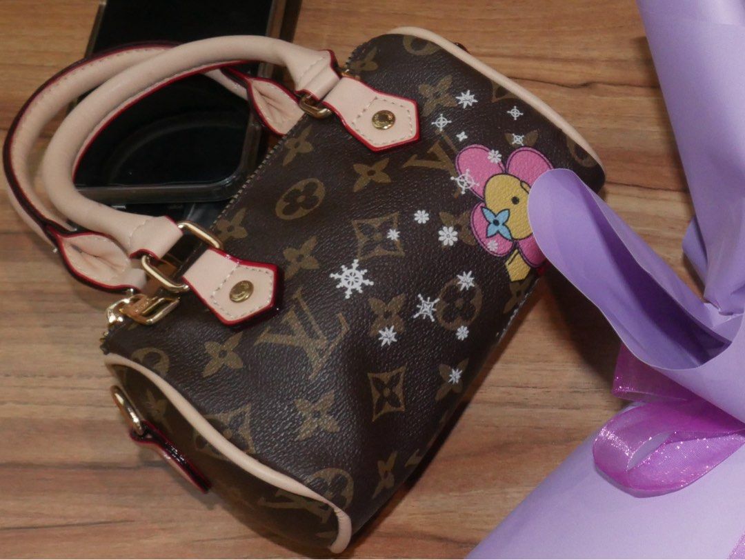 LV Speedy (Category: Luxury Bags & Wallets) located in Subic. Submitted by jujucndy (Listing ID 1466435040, Image 1). Description: NGA! This was just gifted to me before my grad. - monogram canvas with beige leather handle - Gold hardware - can fit your wallet, a powder, travel size perfume, and a pocket sized power bank. - no issues Rfs: need funds. price is negotiable, dm me..