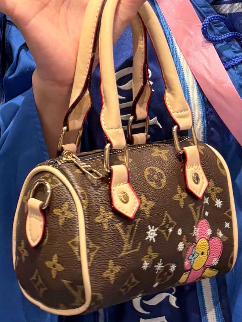 LV Speedy (Category: Luxury Bags & Wallets) located in Subic. Submitted by jujucndy (Listing ID 1466435040, Image 3). Description: NGA! This was just gifted to me before my grad. - monogram canvas with beige leather handle - Gold hardware - can fit your wallet, a powder, travel size perfume, and a pocket sized power bank. - no issues Rfs: need funds. price is negotiable, dm me..