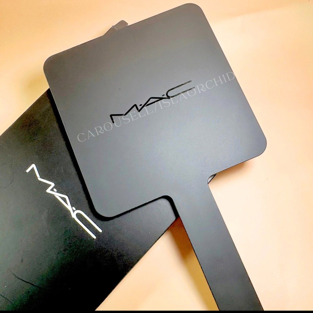 MAC Hand Held Mirror (Category: Makeup) located in Ajuy. Submitted by islaorchid (Listing ID 1466527414, Image 2). Description: ✨MAC Cosmetics Handheld Mirror — Brand New - Comes with original box, and the protective film on the mirror is still intact — never peeled or used. - Authentic. Perfect for personal use or as a gift Iloilo City: **Shipping fee c/o buyer ✨PLEASE READ • No-rush shipping. Allow 2-3 business days for processing. • Item condi