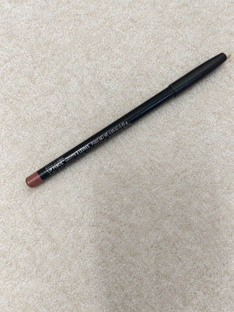 MAC Lip Pencil in Boldly Bare (Category: Makeup) located in Cagayan de Oro. Submitted by simplydecluttering_makeup (Listing ID 1466511257, Image 1). Description: - Brand/Item: MAC Lip Pencil - Shade: Boldly Bare (Versatile brownish-red nude) - Size: Standard 1.45g - Formula: Creamy texture for easy lining and defining - Perfect everyday makeup bag staple that matches various lipstick shades.