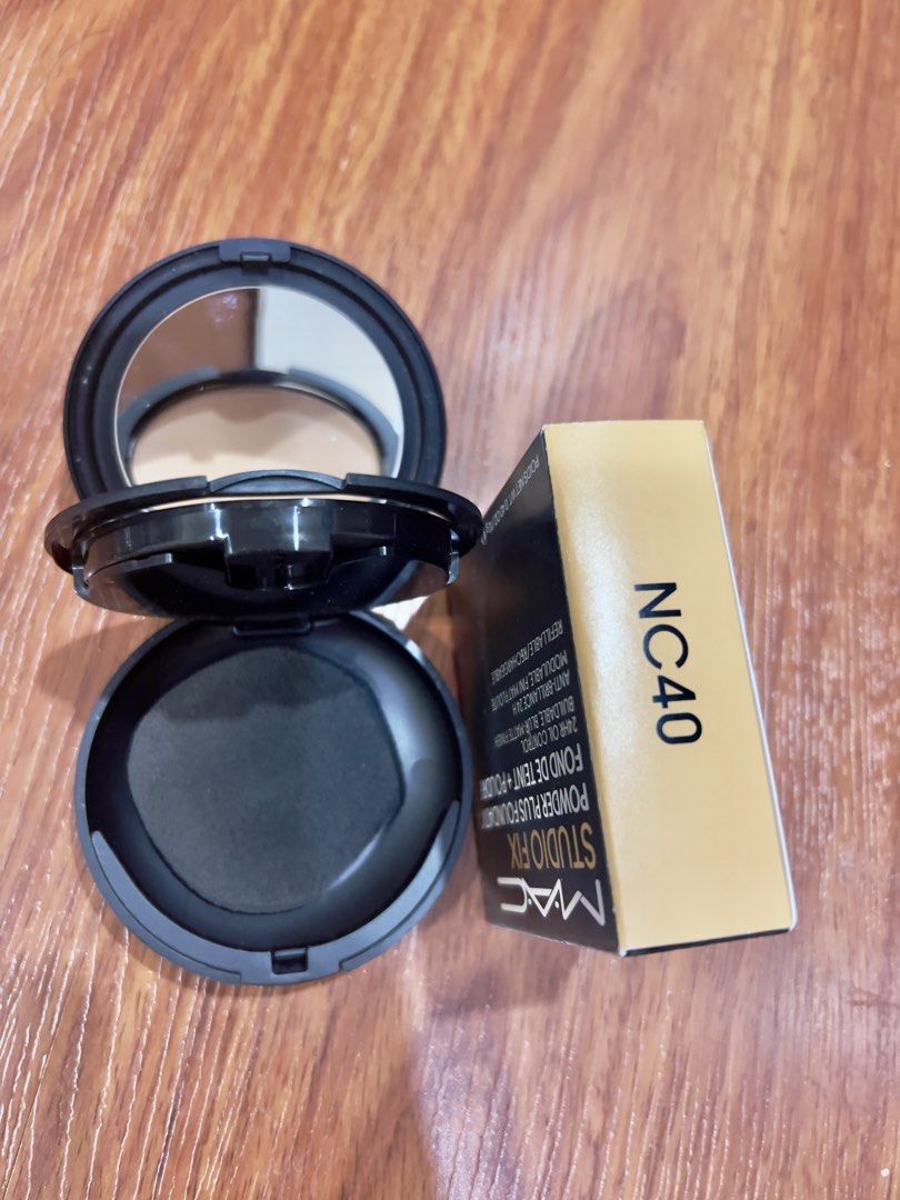 MAC Studio Fix Powder Plus Foundation NC40 (Category: Makeup) located in Taguig. Submitted by yhany08 (Listing ID 1466403928, Image 2). Description: - Authentic MAC Studio Fix Powder Plus Foundation - Shade: NC40 (Perfect for medium skin with golden undertones) - Size: 12g net weight - Condition: Brand new, never used (box opened for photos only) - Finish: 24hr oil control with buildable blur-matte coverage - Inclusions: Original box, built-in mi