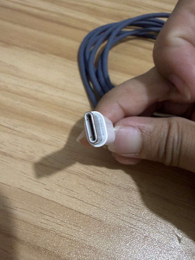 Macbook charger (Category: Chargers) located in Baguio. Submitted by yaniegc (Listing ID 1466480147, Image 3). Description: Price negotiable RFS: Have 2 chargers Color: midnight blue.
