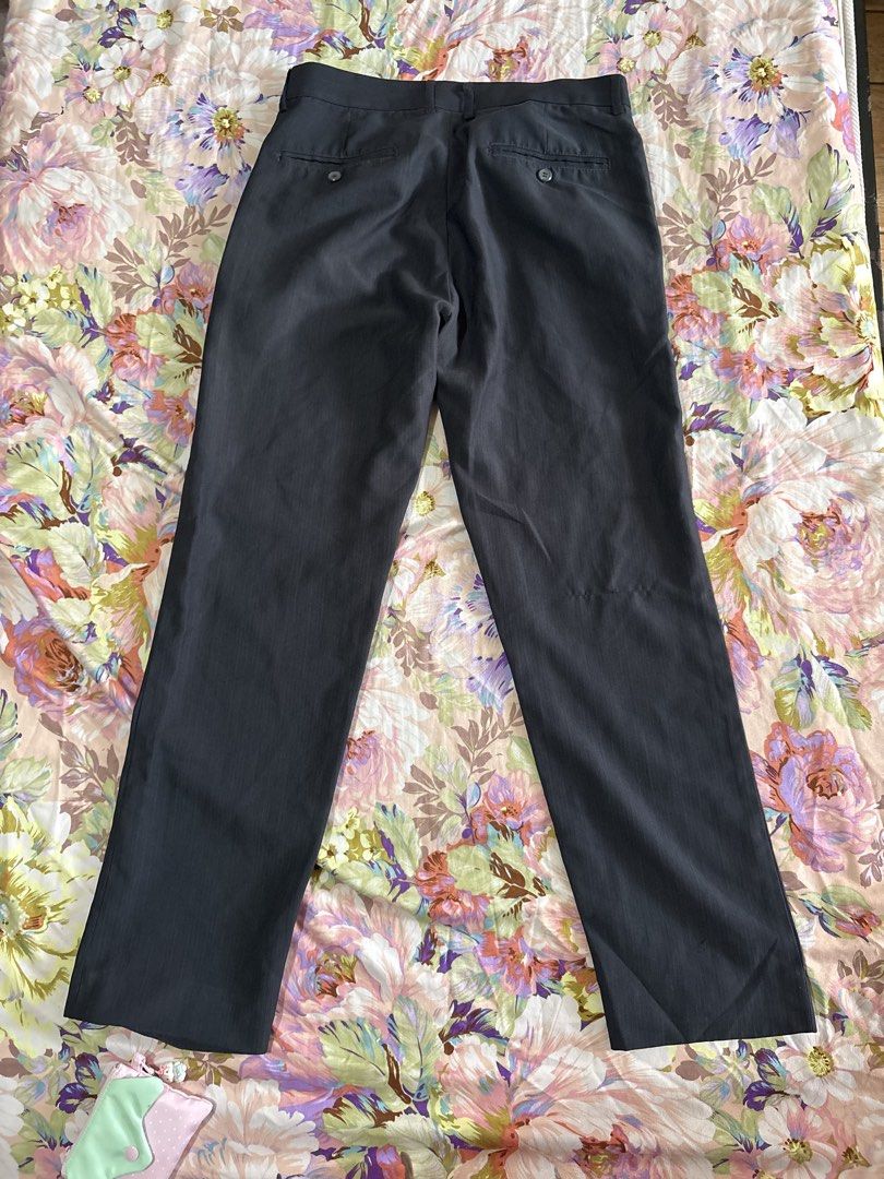 Main Street Black Trousers Size 32 (Category: Trousers) located in Paranaque City. Submitted by delikaite (Listing ID 1466397966, Image 2). Description: - Brand: Main Street - Size: 32 waistband - Fit: Straight leg cut with belt loops - Closure: Standard zip fly and button - Pockets: Two back welt pockets with button fastenings - Fabric: Lightweight with subtle texture - Condition: Clean, ready to wear for work or casual outings.
