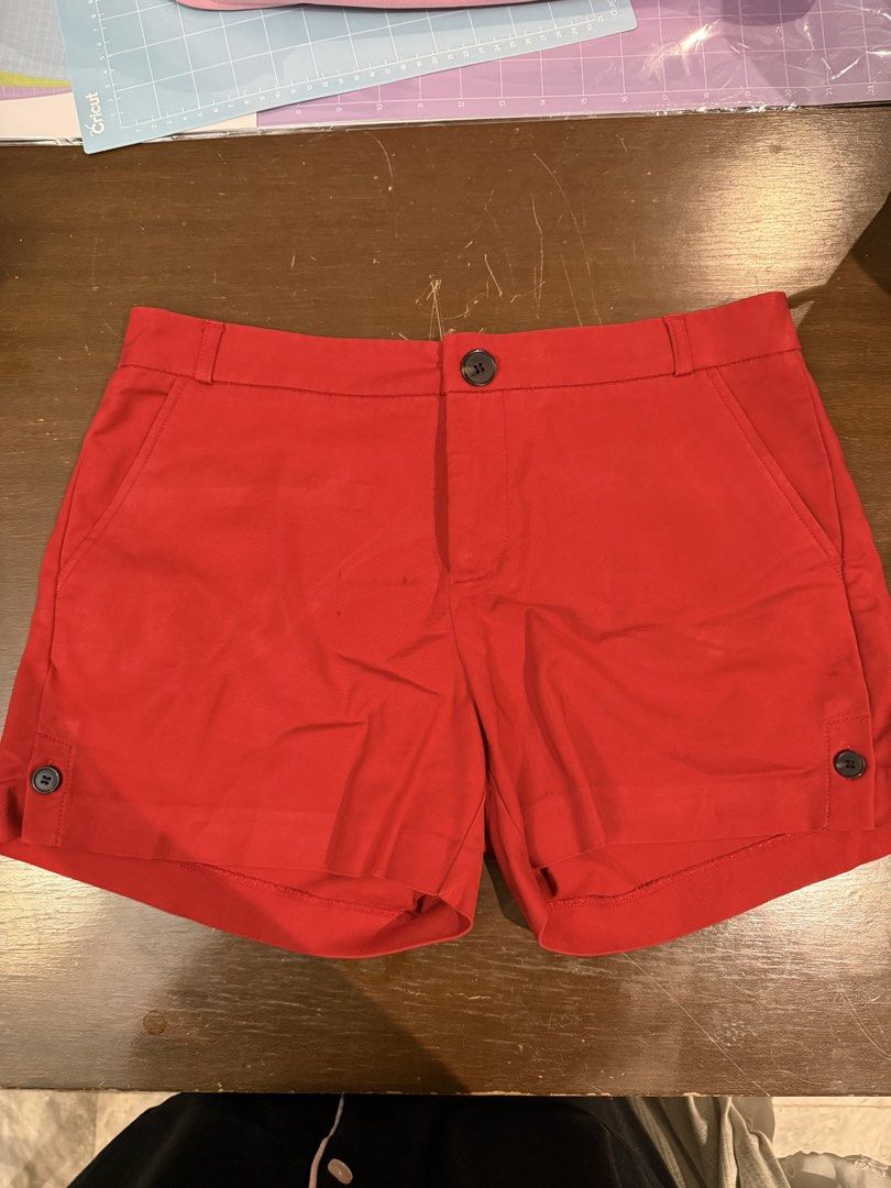 Mango Basics Red Shorts Size US 8 EUR 40 (Category: Shorts) located in Quezon City. Submitted by nsseller (Listing ID 1466461788, Image 1). Description: - Brand: Mango Basics - Size: EUR 40 / USA 8 / MEX 7 - Color: Bright red - Closure: Front button with zipper fly - Pockets: Functional side pockets - Details: Cute button tab accents near leg openings - Condition: Clean and vibrant, ideal for warm weather.