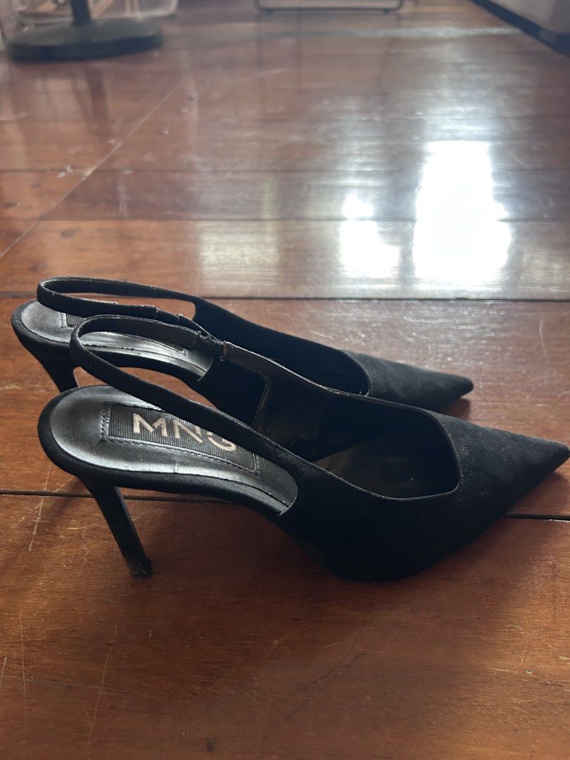 Mango Black Suede Slingback Heels (Category: Heels) located in Cebu City. Submitted by shopmikascloset (Listing ID 1466362412, Image 3). Description: - Brand: MNG - Style: Slingback heels with pointed toes and stiletto heels - Color: Classic black - Condition: Well-loved ; slight scuffing on heel tips and soles, clean upper material - Ideal for: Work, formal events, or smart-casual wear.