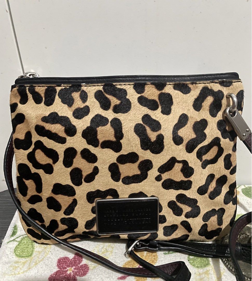 Marc Jacobs Leopard Calfskin Sling Bag (Category: Cross-body Bags) located in Antipolo. Submitted by lilhermes (Listing ID 1466455124, Image 1). Description: In very good condition Sling Bag in Small to Medium size Made of Calfskin .